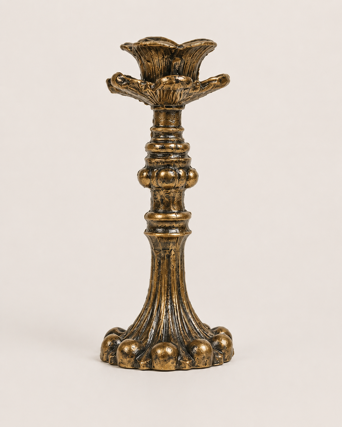 Ornate Metal Candlestick on white background