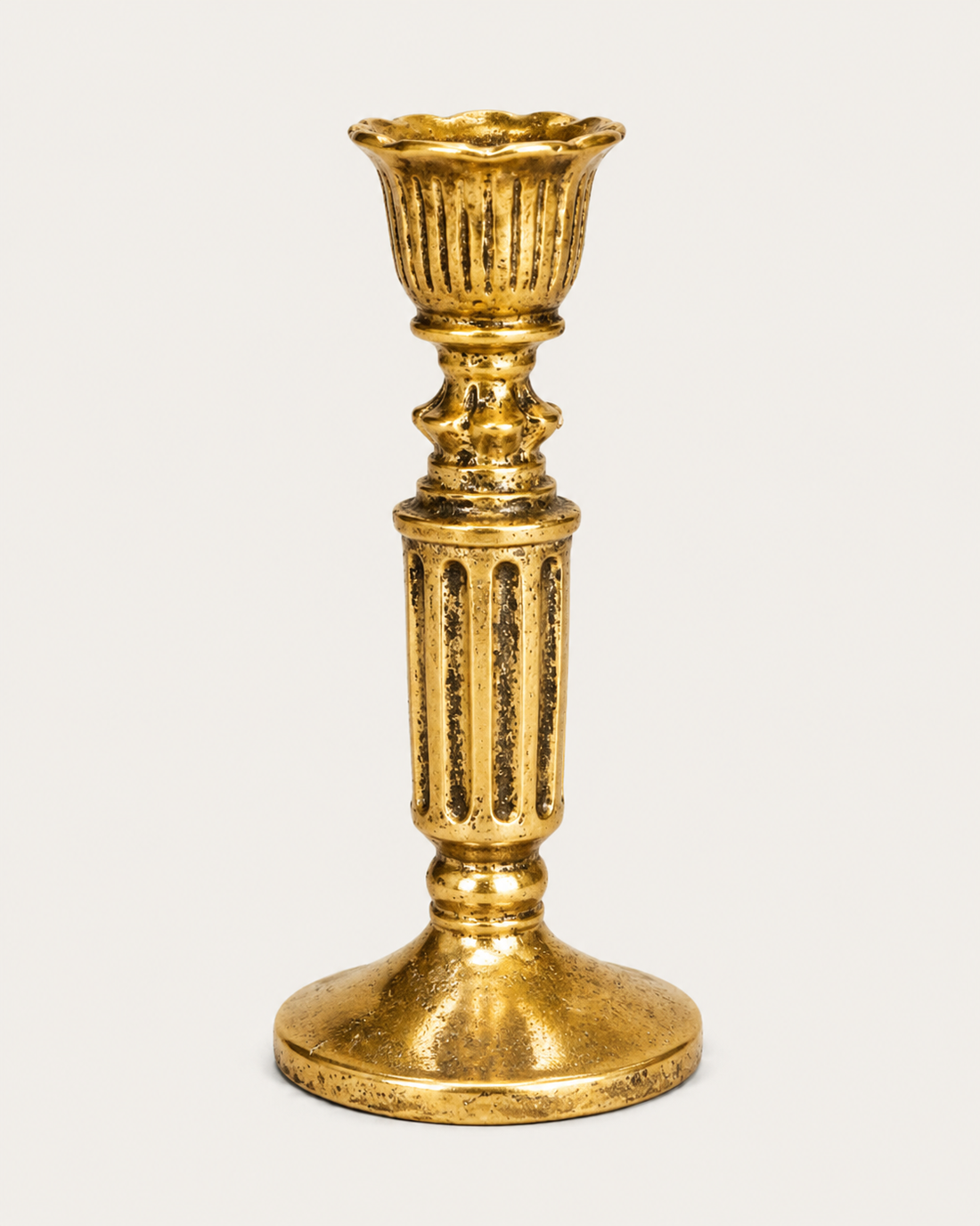 Ornate Metal Candlestick on white background