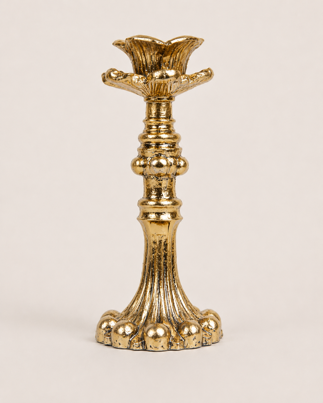 Ornate Metal Candlestick on white background