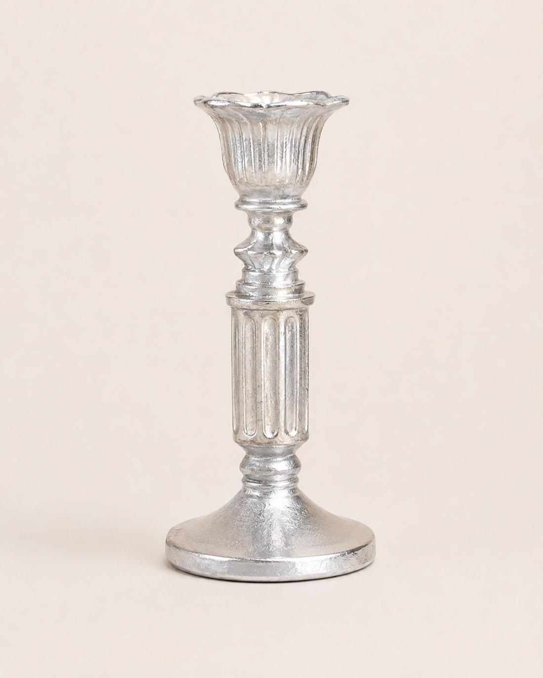 Ornate Metal Candlestick on white background