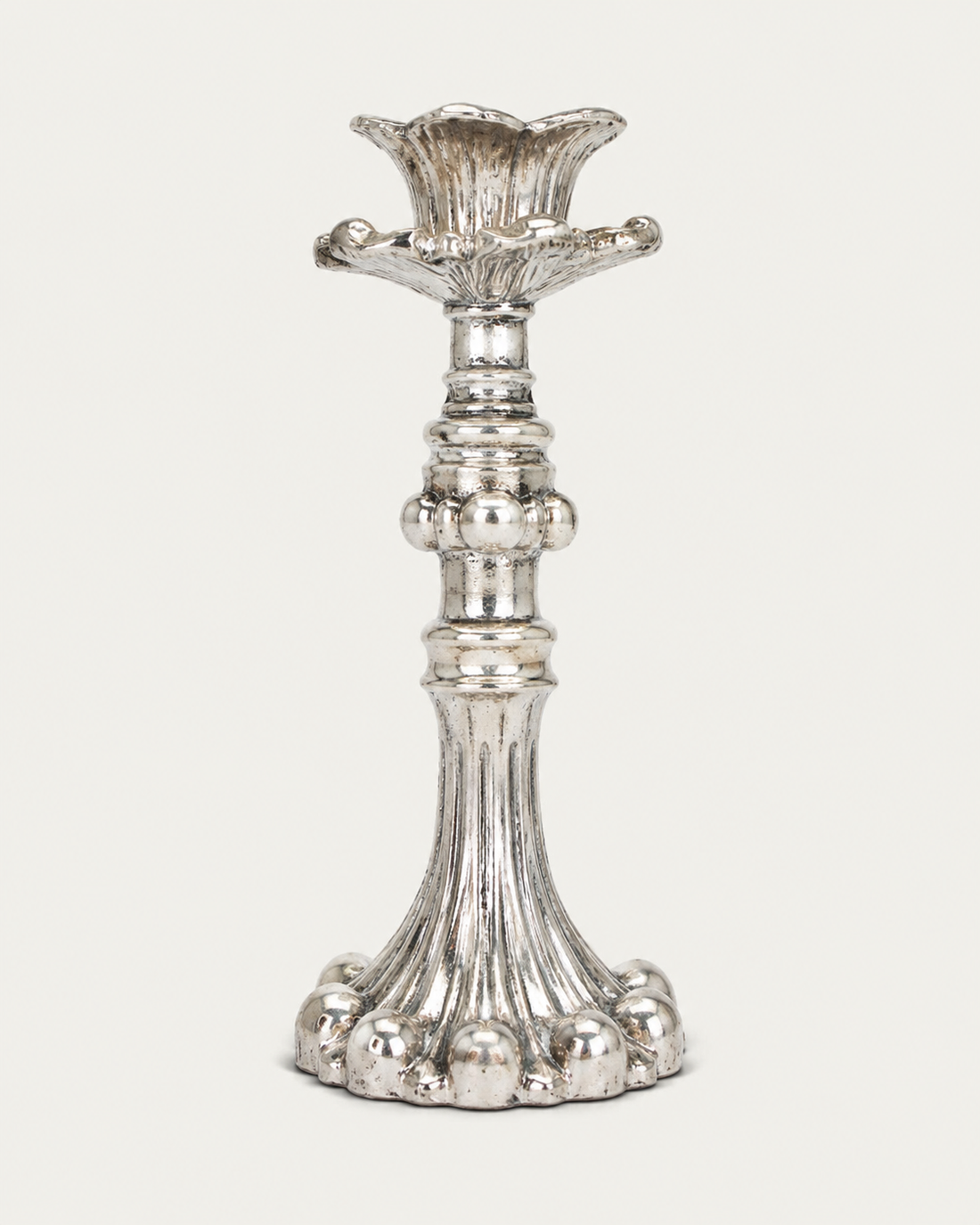 Ornate Metal Candlestick on white background