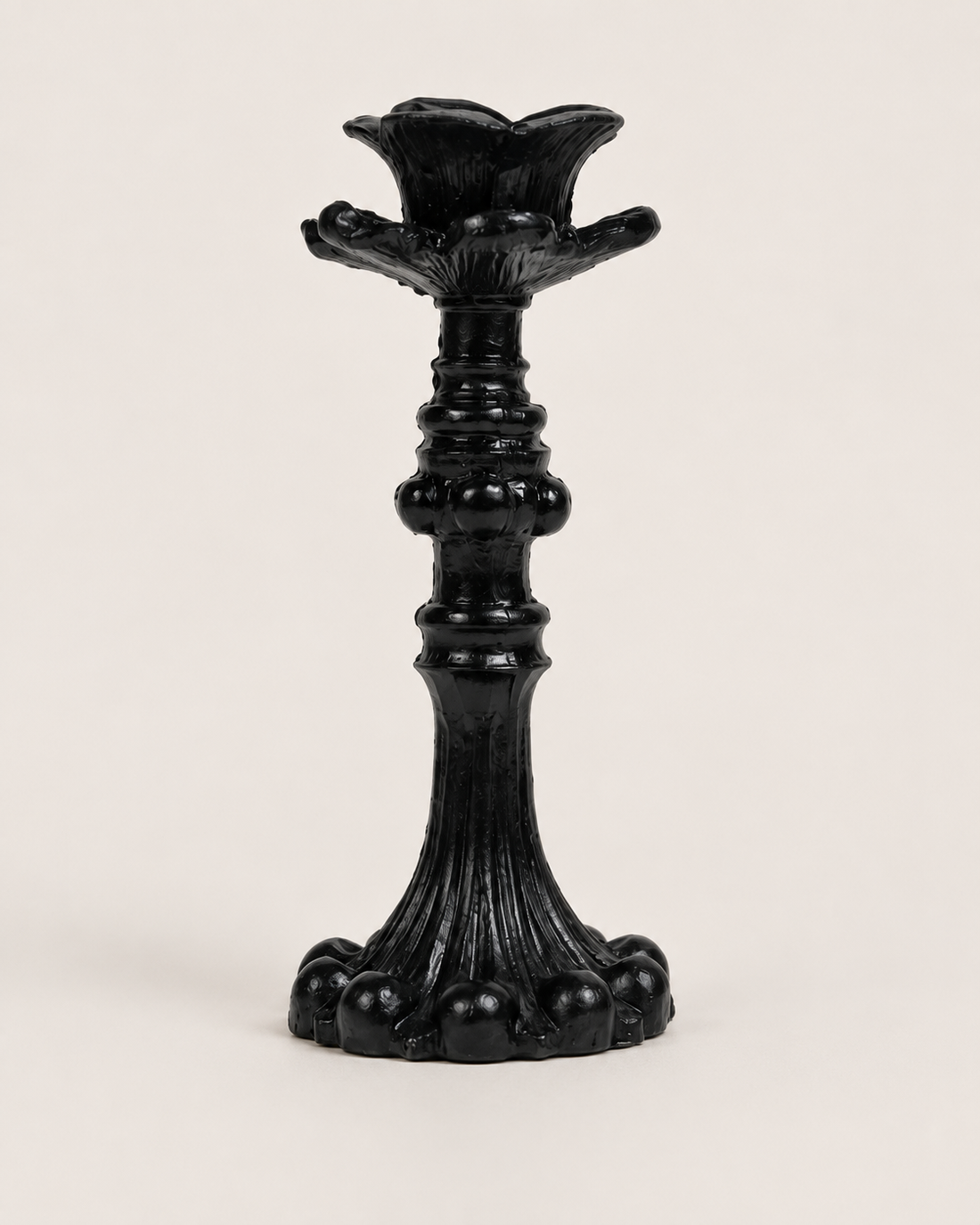 Ornate Metal Candlestick on white background
