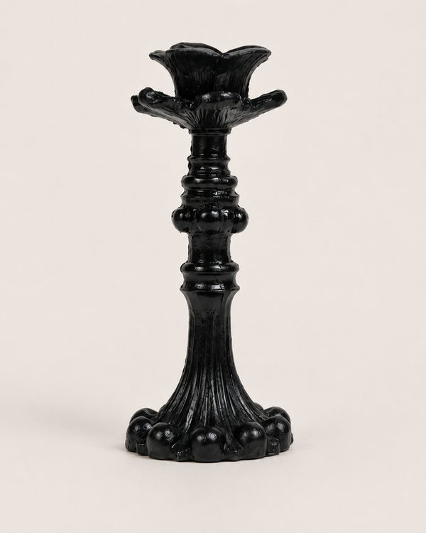 Ornate Metal Candlestick on white background